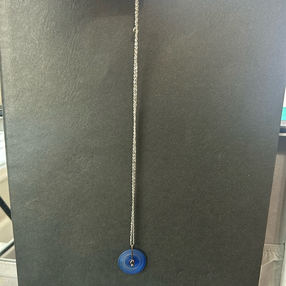 Silver 18 inch necklace with blue glass pendant bought in Maine